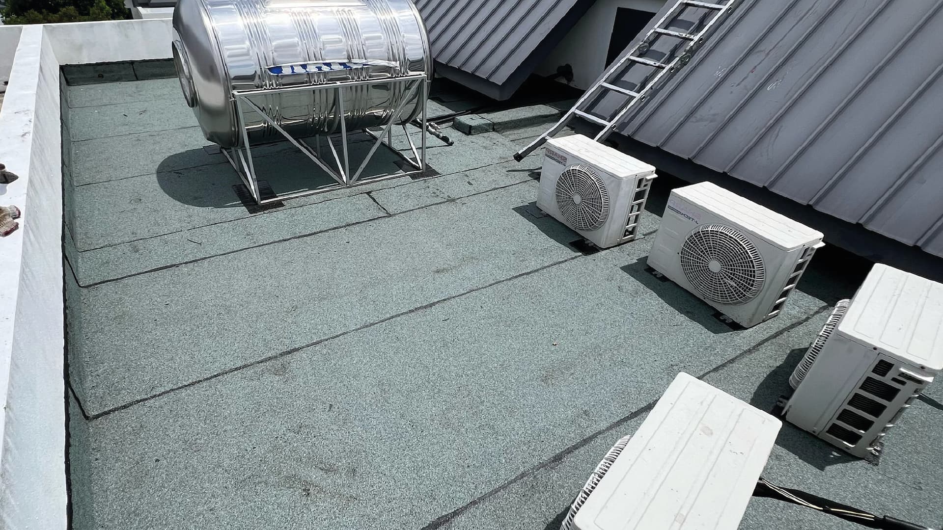 Rooftop watertank 1 torch on system (mineral membrane) after