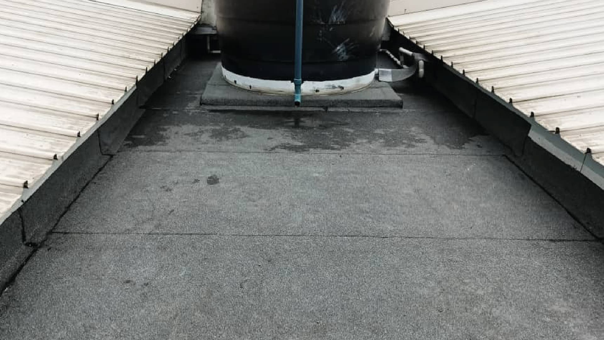 Rooftop watertank 2 torch on system (mineral membrane) after