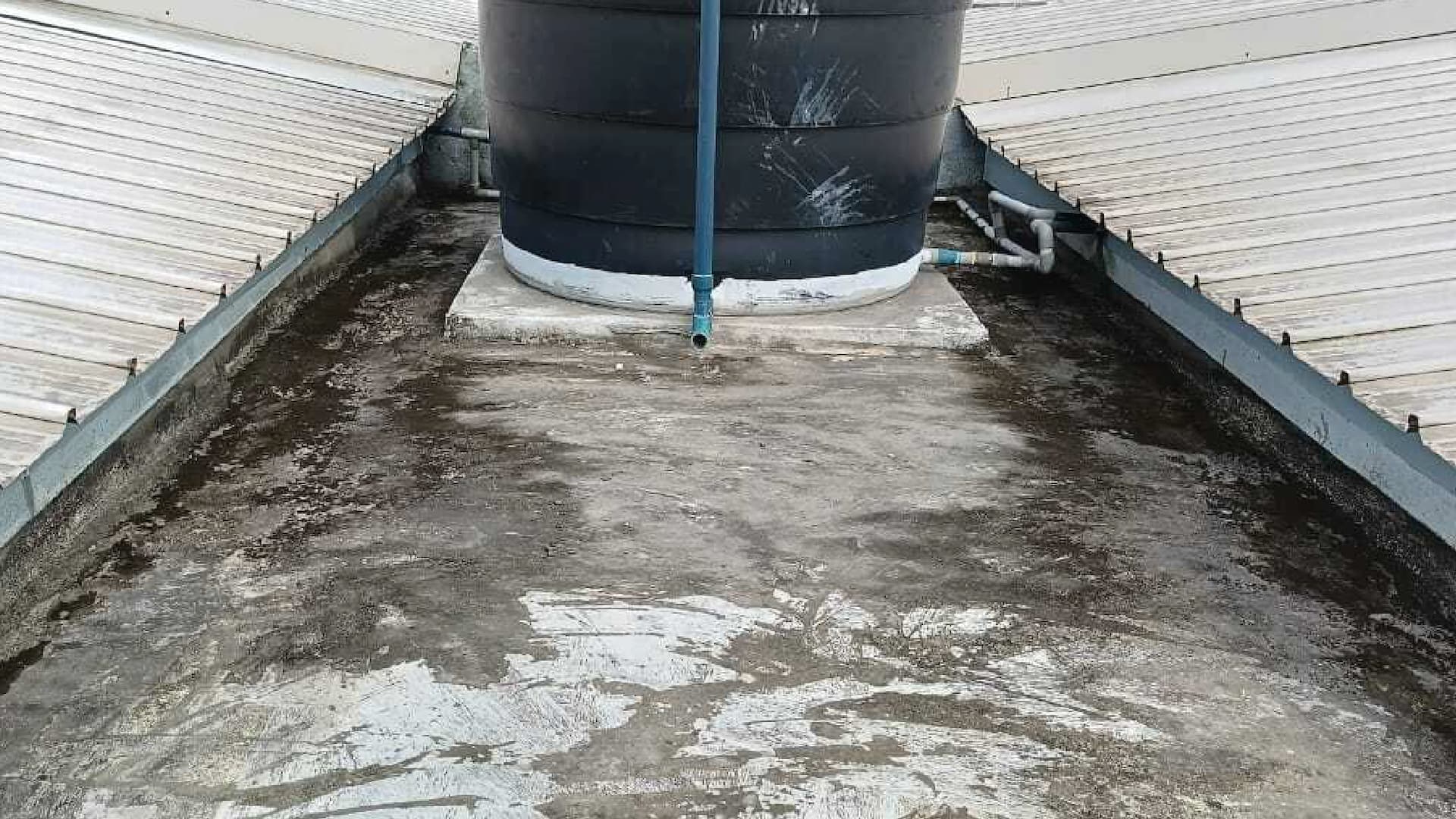 Rooftop watertank 2 torch on system (mineral membrane) before