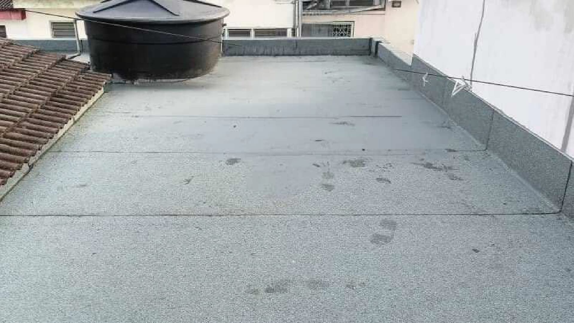 Rooftop watertank 3 torch on system (mineral membrane) after