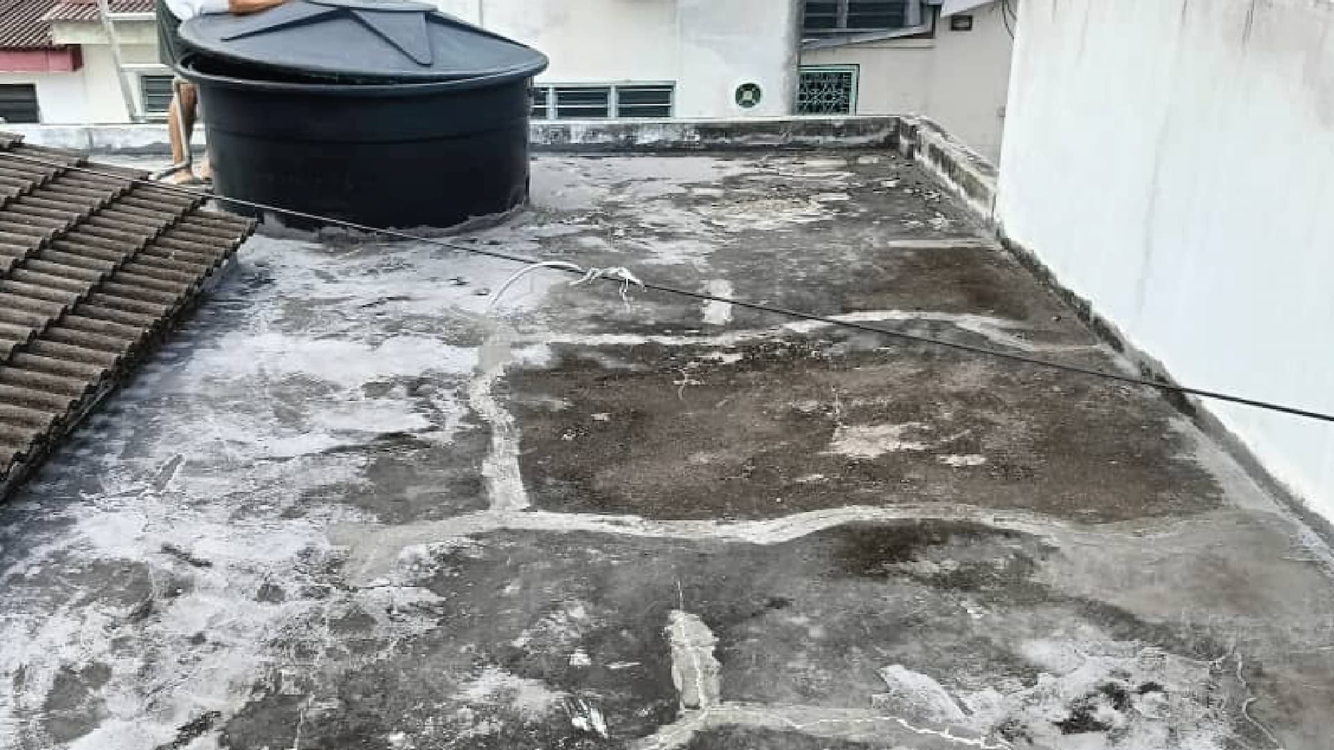 Rooftop watertank 3 torch on system (mineral membrane) before