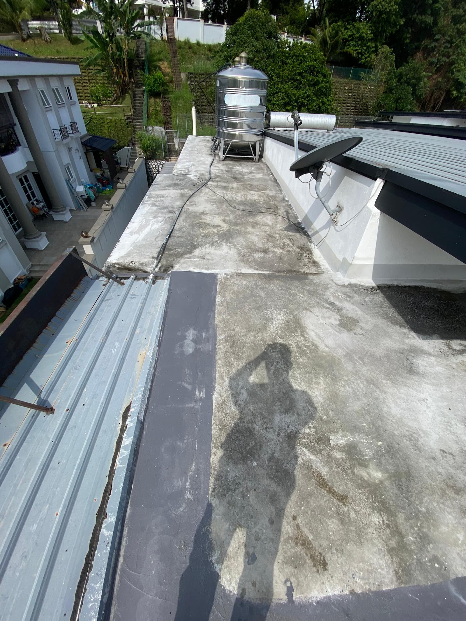 Rooftop watertank 4 torch on system (mineral membrane) before